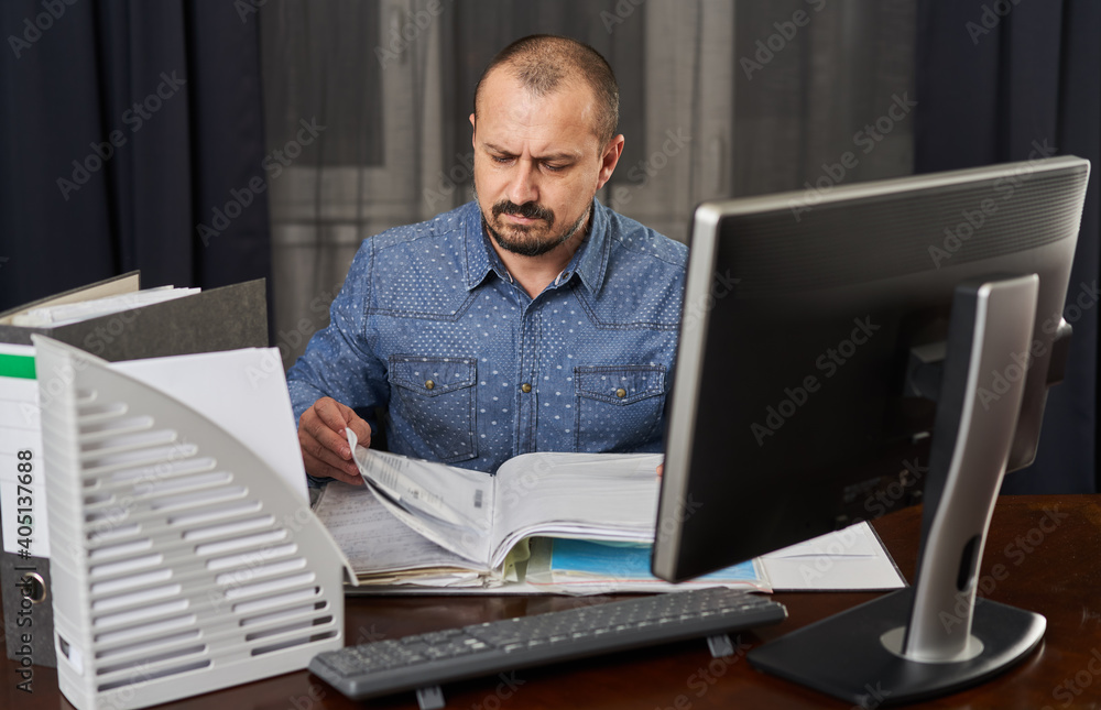 Businessman working at his computer Businessman working at his computer
