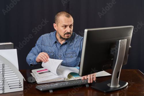 Businessman working at his computer