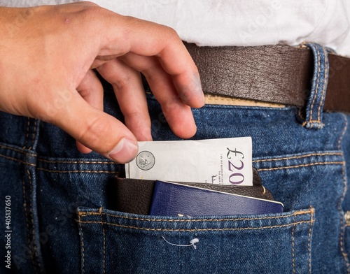 Bild auf Leinwand Pickpocket in action - Wallet and passport.