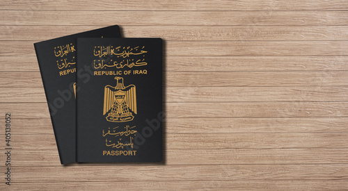 Close up of Iraq passport on a wooden table
