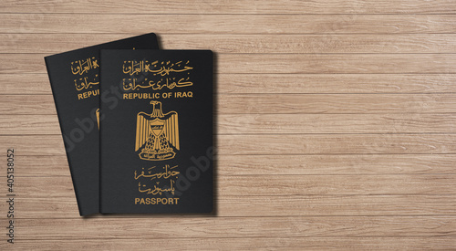 Close up of Iraq passport on a wooden table