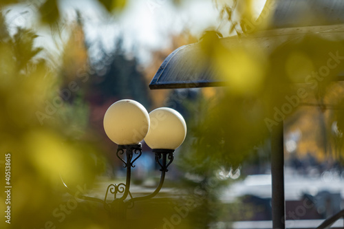 Decorative lantern in the autumn park.