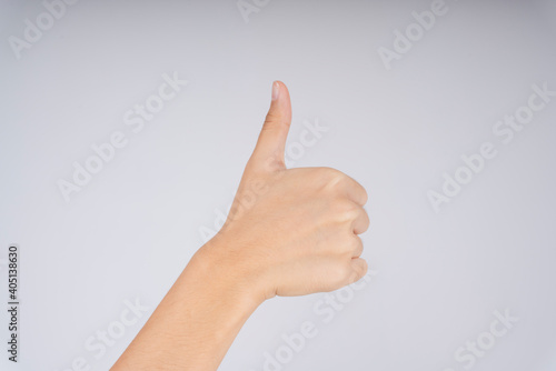 Gesture thumb up isolated on white background. Like it signal.