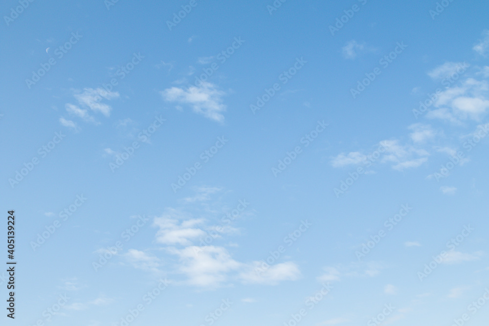 Blue sky with white clouds, abstract art background.