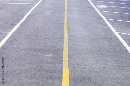 Yellow lines on the road.