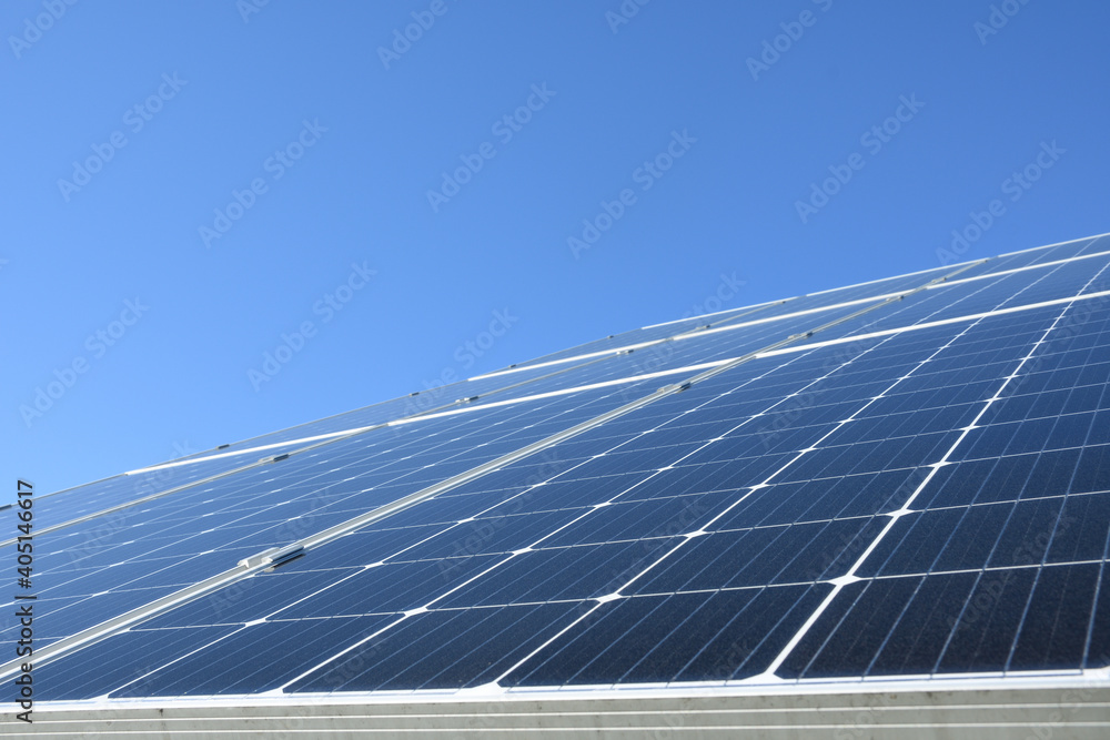Solar panels against blue sky background.Against The Deep Blue Sky in suny weather - obrazy, fototapety, plakaty 