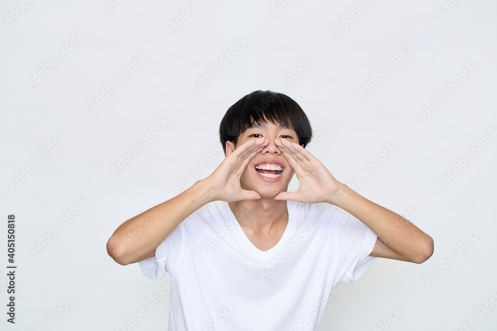 young man holding hands near opened mouth Announcement young man holding hands near opened mouth Announcement