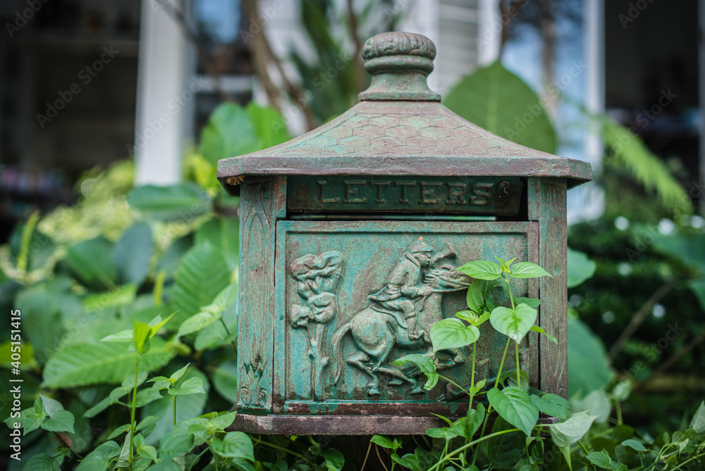 Antique iron cabinet for mailing in front of an old house in Chiang Rai, Thailand Antique iron cabinet for mailing in front of an old house in Chiang Rai, Thailand