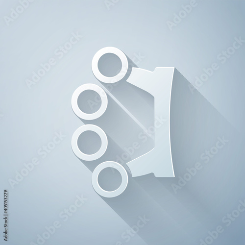 Paper cut Brass knuckles icon isolated on grey background. Paper art style. Vector.