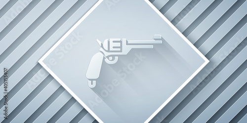 Paper cut Revolver gun icon isolated on grey background. Paper art style. Vector.