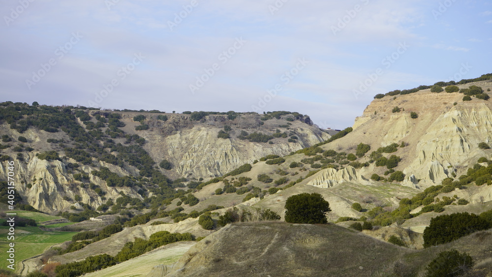 View of the Kuladokiya mountains. An unusual volcanic rock formation in the city of Kula, Turkey. View of the Kuladokiya mountains. An unusual volcanic rock formation in the city of Kula, Turkey.