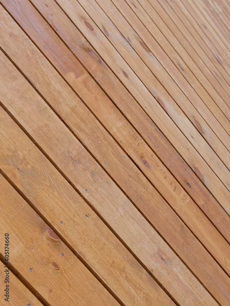 Fototapeta premium Sloped plank surface. Selective focus.