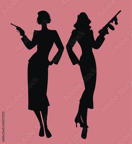 Elegant silhouettes of two ladies retro style, wearing elegant clothes and armed with submachine and gun. Classic film noir style. photo