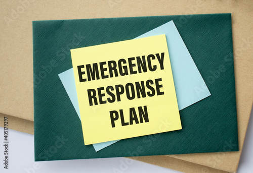 ERP as an emergency response procedure, the text is written on a yellow sticker lying on the office table among the papers.