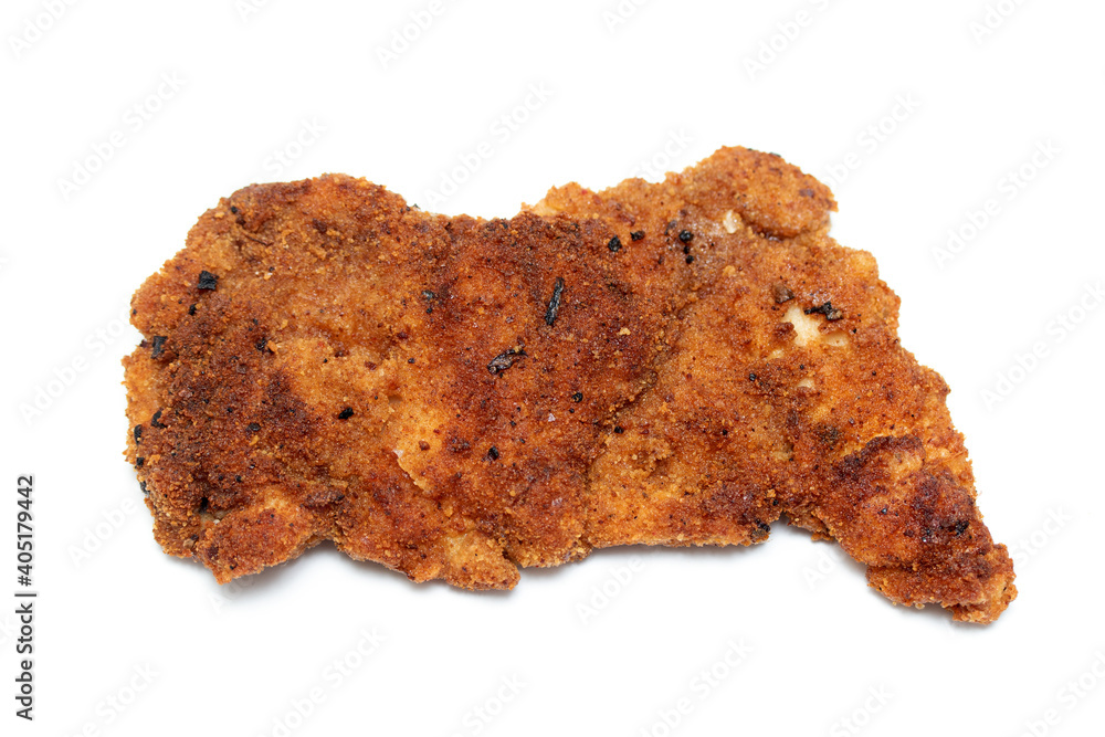 Fried chicken steak in bread crumbs on a white plate. Fried chicken steak in bread crumbs on a white plate.