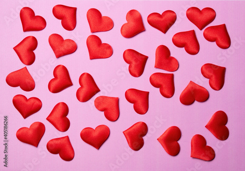 Valentine's day many red hearts on pink paper background, love concept for 14 february or valentine day