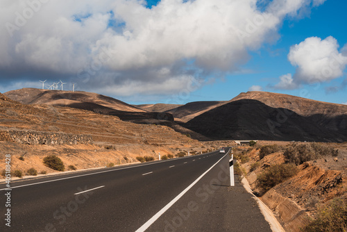 Lonely road between the arid mountains of Lanzarote
