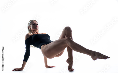 sexy woman isolated on white. lady with straight slim body. female beauty care. smooth legs skin. concept of epilation and phlebeurysm. acid pedicure in salon. health. feet massage