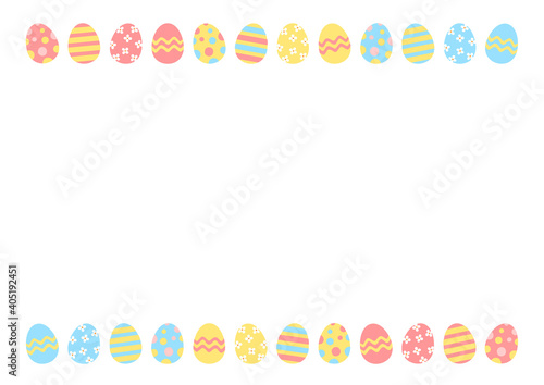 Easter decoration. Easter frame of colored easter eggs on white background with space for text.