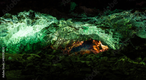 Panoramic view of green cave lava tube illuminated in Canary Islands. Geological cavern formation, tourist attraction concepts photo