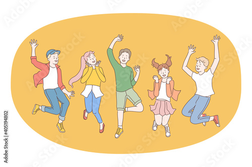 Children, friendship, happiness concept. Group of smiling cheerful children friends jumping together during walk or party celebration. Fun leisure recreation for teens children 