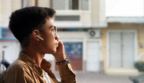 Latino passenger using public transportation to go to work, while looking around, on and off the bus