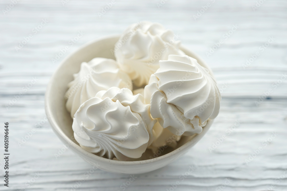 Zephyr in a ceramic bowl on a white wooden background