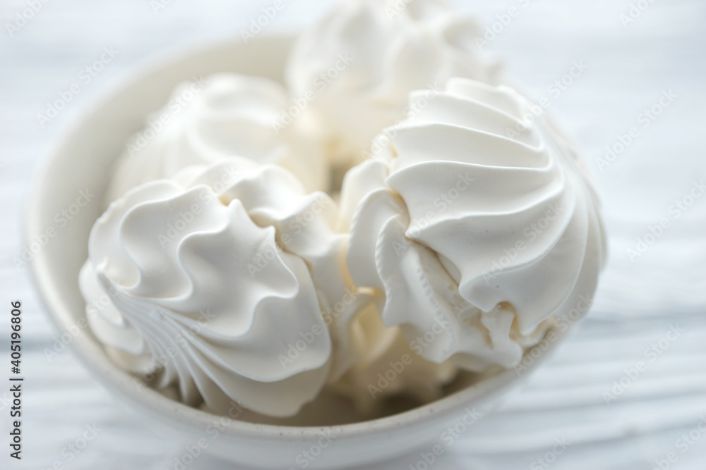 Zephyr in a ceramic bowl on a white wooden background