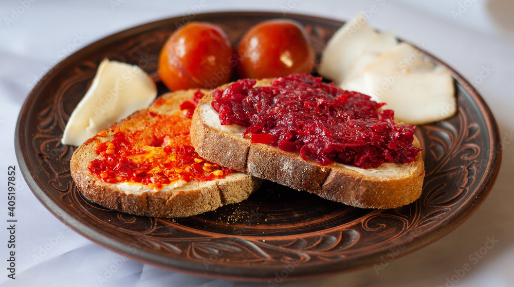Ordinary Ukrainian food: bread, bacon, tomato, cheese Ordinary Ukrainian food: bread, bacon, tomato, cheese