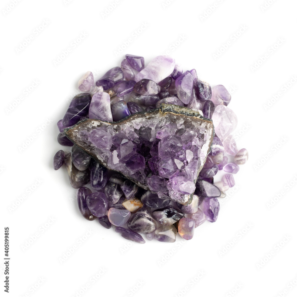 Amethyst crystals isolated. Purple quartz pebbles and crystal Amethyst crystals isolated. Purple quartz pebbles and crystal