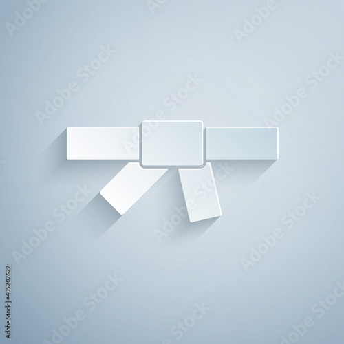 Paper cut Black karate belt icon isolated on grey background. Paper art style. Vector.