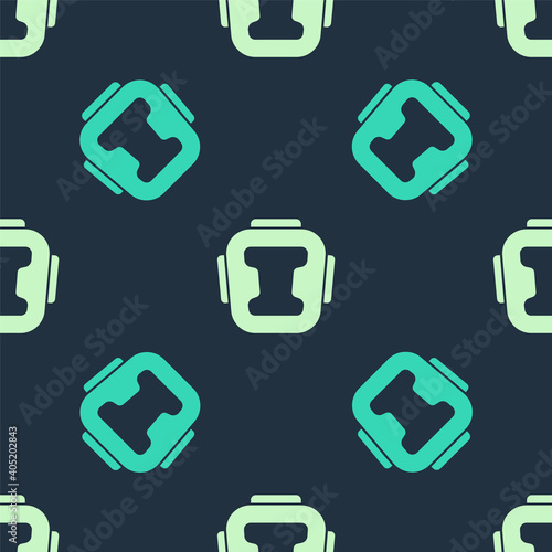 Green and beige Boxing helmet icon isolated seamless pattern on blue background. Vector.