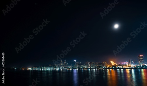 Big Dnieper river in the huge night bright city of Dnipropetrovsk in Ukraine