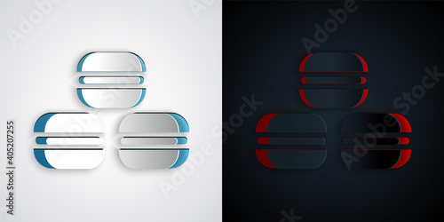 Paper cut Macaron cookie icon isolated on grey and black background. Macaroon sweet bakery. Paper art style. Vector.