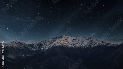 starry night sky over mountain