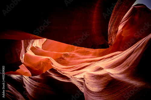Red sandstone textures of Antelope Canyon, the most-visited and most photographed slot canyon in the American Southwest located on Navajo land near Page, Arizona, USA. 