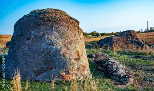 Huge deposits of stone minerals in a clearing bathed in warm sun in picturesque Ukraine