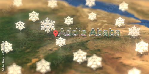 Addis Ababa city and snowy weather icon on the map, weather forecast related 3D rendering © Alexey Novikov