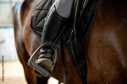 Фотография rider's foot in the stirrup