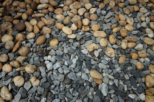 Colorful small pebbles or stones gravel texture or stone in garden with difference color.