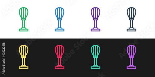 Set line Punching bag icon isolated on black and white background. Vector.