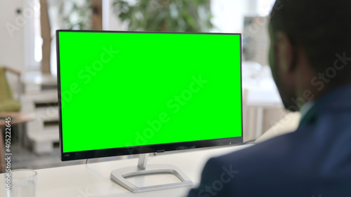 Businessman Using Desktop with Green Chroma Key Screen 