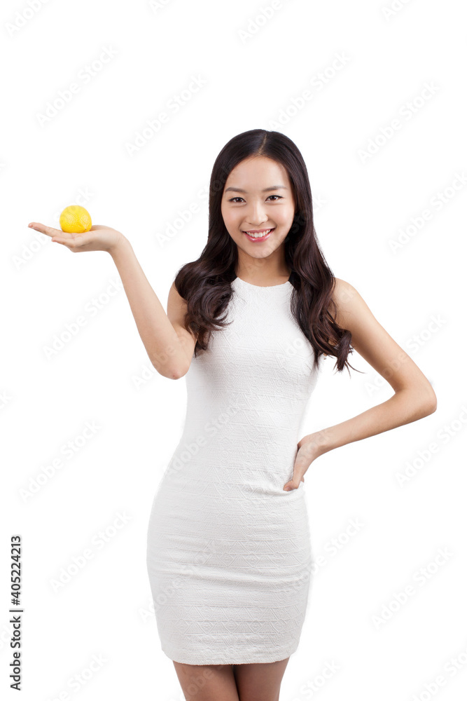Portrait of a Young woman holding lemon Portrait of a Young woman holding lemon