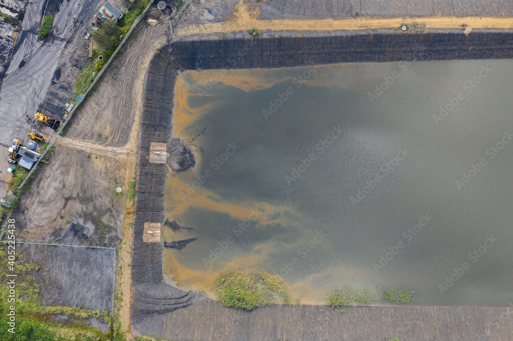 Industrial coal mine, abstract sendimentation tank of mine in Poland. Industrial lake Aerial drone view Industrial coal mine, abstract sendimentation tank of mine in Poland. Industrial lake Aerial drone view