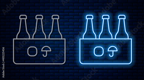 Glowing neon line Pack of beer bottles icon isolated on brick wall background. Case crate beer box sign. Vector.