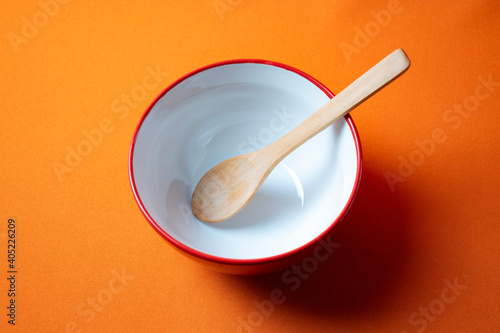 white plate on orange background