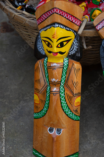 Carved out of a single piece of wood, these dolls from ancient folklore and mythology are characterised by their vibrant colours and distinctive ethnic style photo