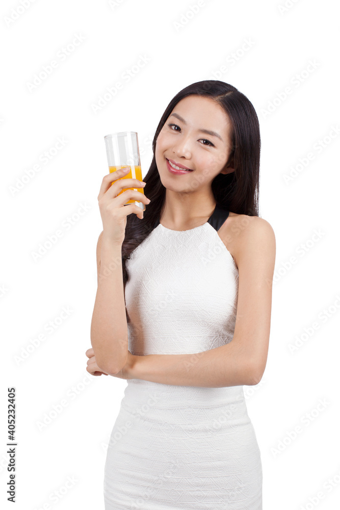 Young woman holding a cup of juice Young woman holding a cup of juice