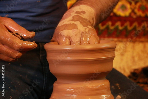 The master making soil water jug ​​in Cappadocia