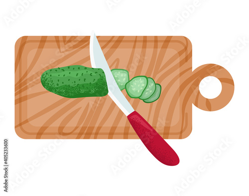 Wooden kitchen food board with organic green cucumber, knife cut vegetable fl...